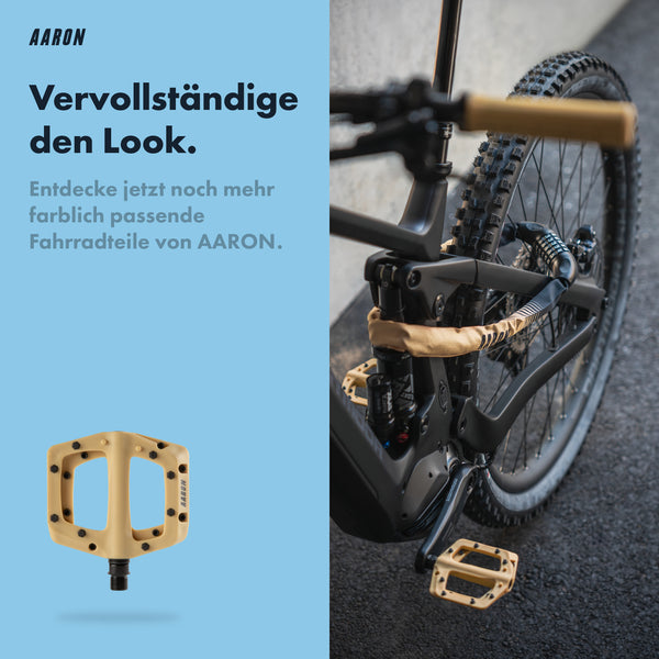 AARON Lock One Fahrradschloss mit Zahlencode - Beige Werbebild mit beigem Fahrradpedal am Mountainbike