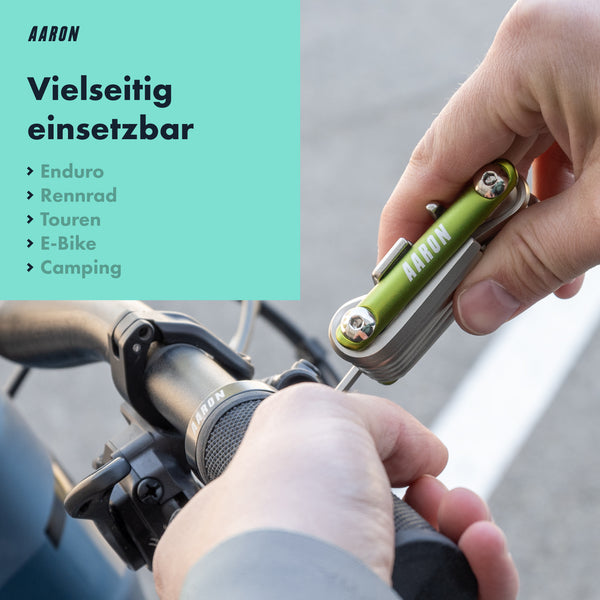 AARON Tool 20 in 1 Multitool - Fahrrad Multifunktionswerkzeug Grün im Einsatz am Rennrad-Lenker beim Outdoor-Einsatz.