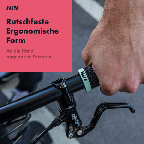 AARON MTB Fahrradgriffe - Mint mit rutschfester, ergonomischer Form und handangepassten Texturen am Fahrradlenker.